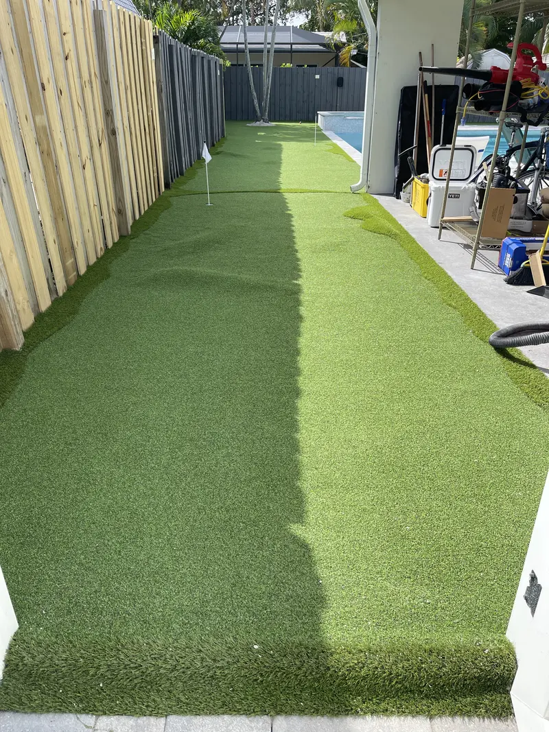 After: a finished backyard putting green in Boynton Beach