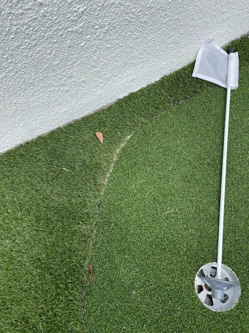 Finished · detail: canal-side putting green in Pembroke Pines, FL, photo 5 of 8