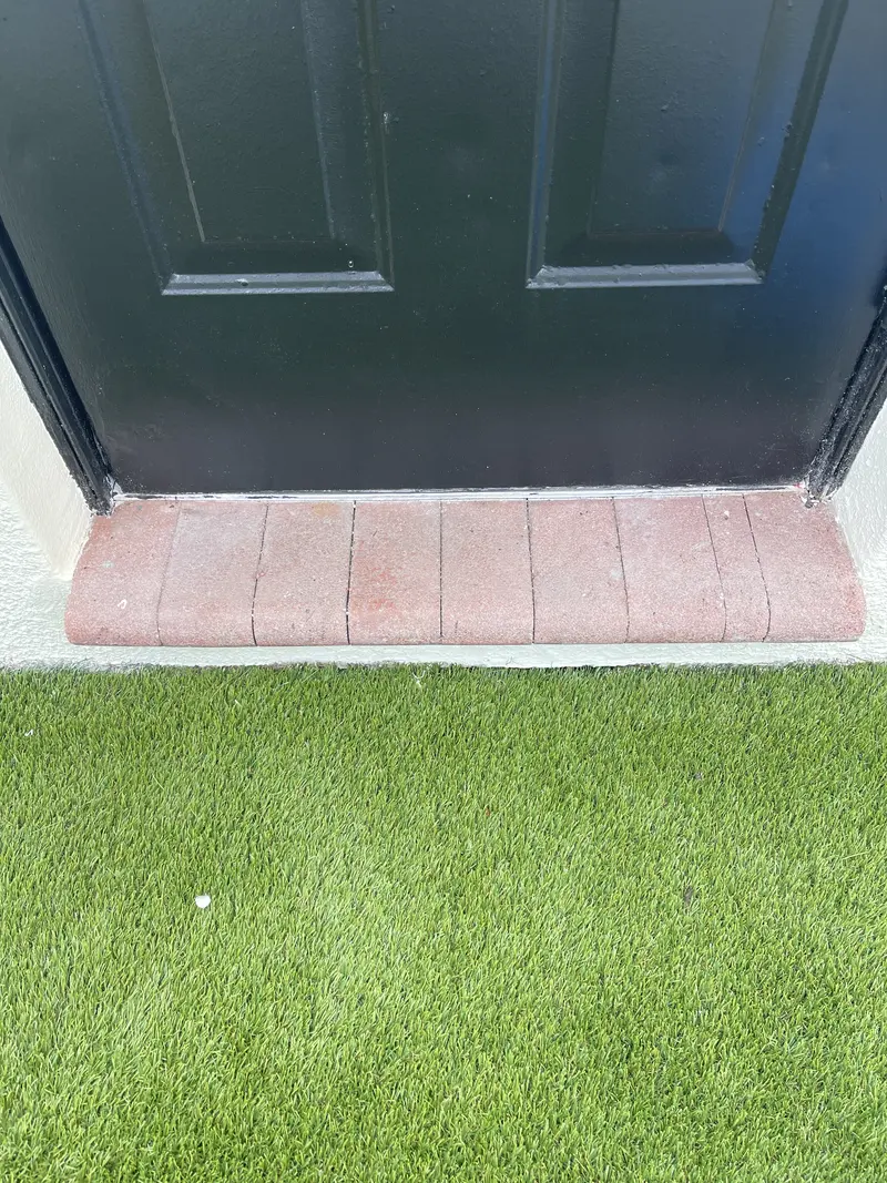 Finished · detail: canal-side putting green in Pembroke Pines, FL, photo 7 of 8