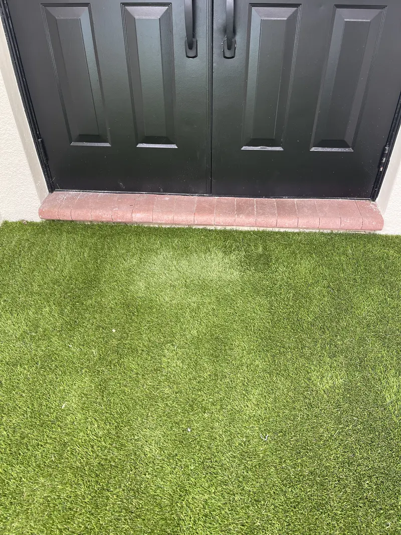 Finished · detail: canal-side putting green in Pembroke Pines, FL, photo 8 of 8