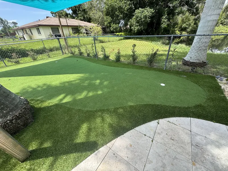 Finished: pool patio putting green in South Florida, photo 1 of 3