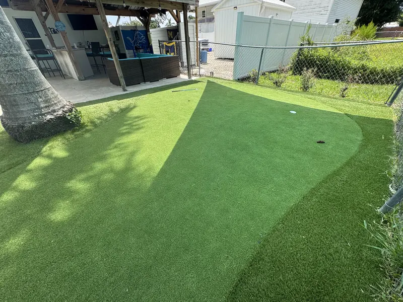 Finished: pool patio putting green in South Florida, photo 2 of 3