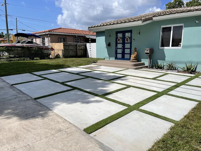 Finished: turf strips between driveway slabs in South Miami, FL, photo 2 of 5