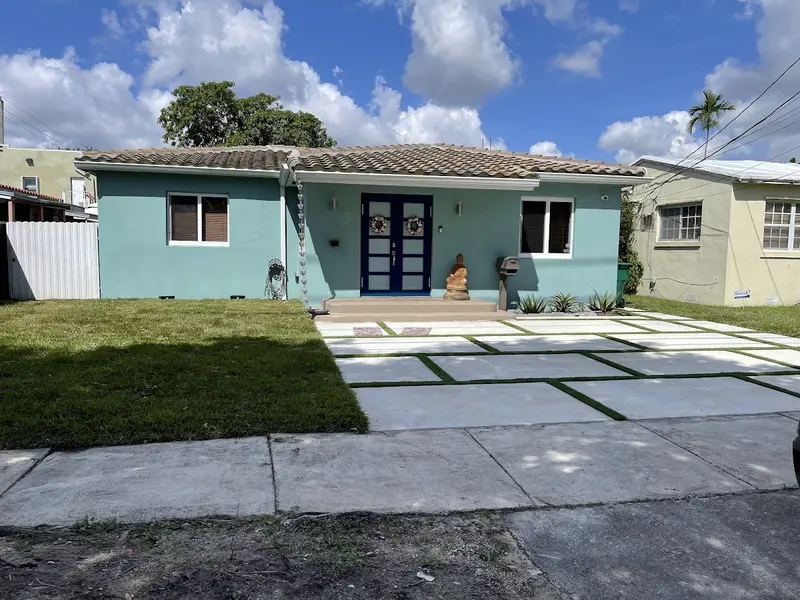 Finished: turf strips between driveway slabs in South Miami, FL, photo 3 of 5