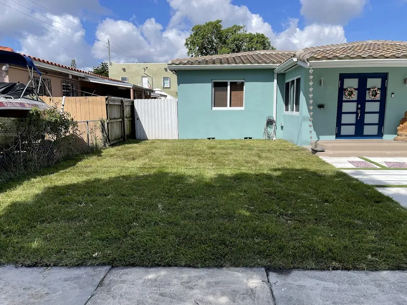 Finished: turf strips between driveway slabs in South Miami, FL, photo 5 of 5